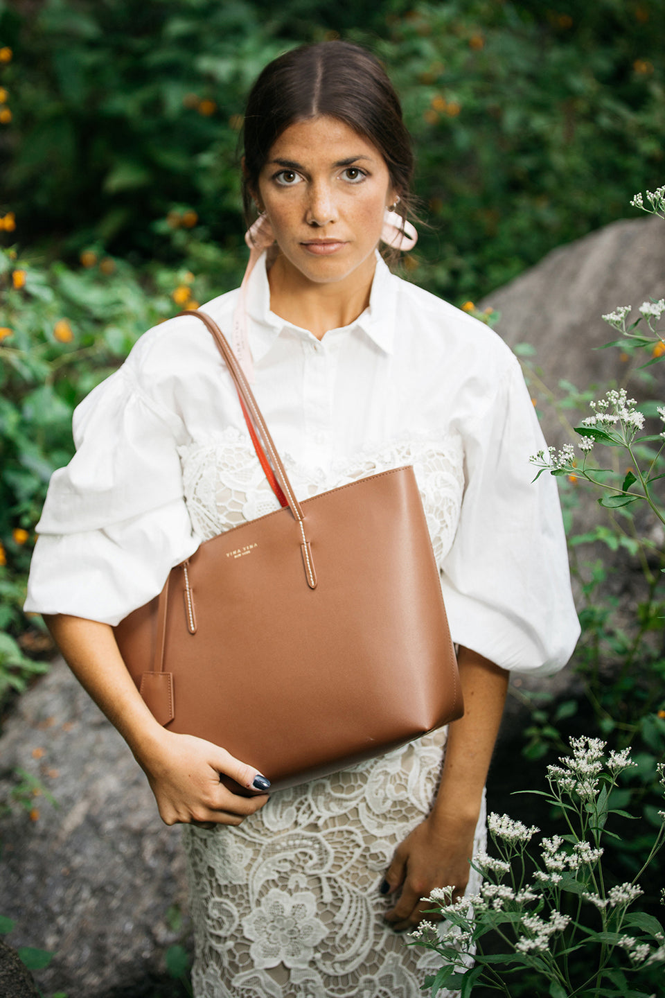 Model Wearing Kafka Large Tote – Chocolate Leather – Lightweight Everyday Tote Bag